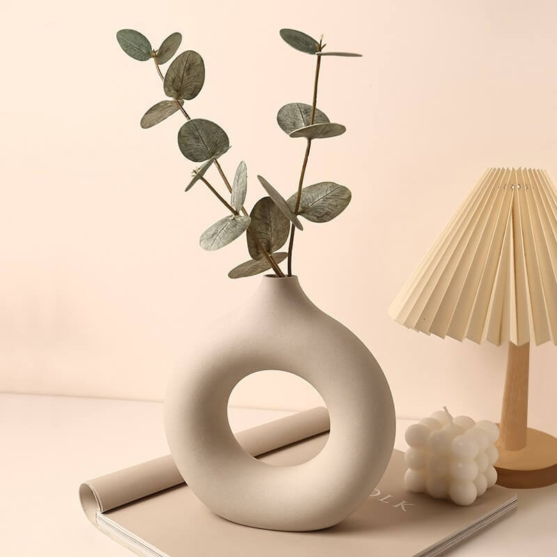 Medium-sized ceramic vase paired with a single eucalyptus tree decoration.