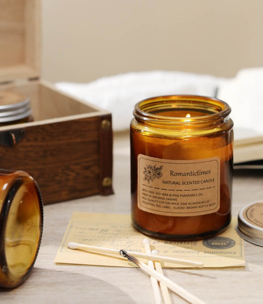 A vintage-style scented candle exudes the rich scent of deep sandalwood.