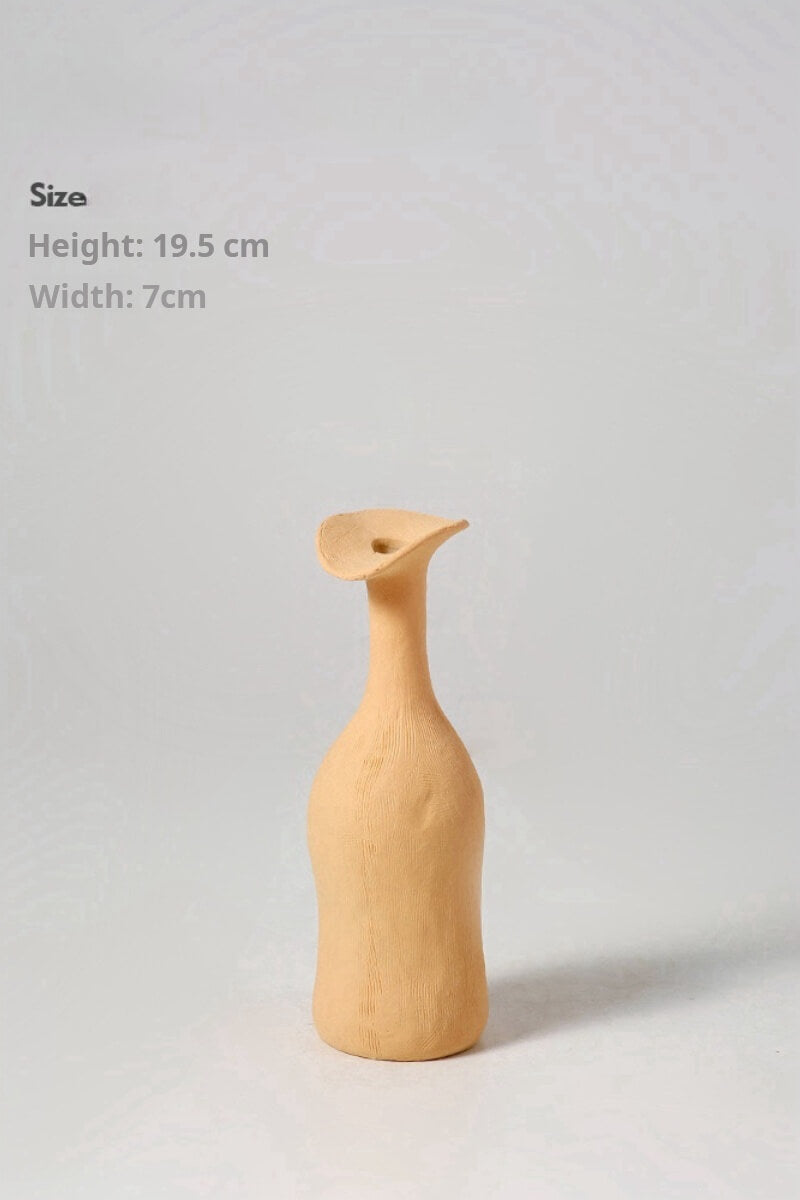 Apricot Yellow Ceramic Vase - A vibrant apricot yellow ceramic vase, adding liveliness.