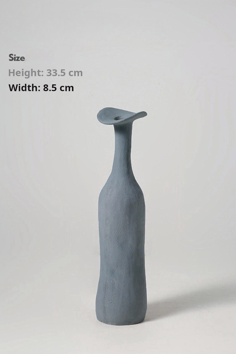 Aqua Blue Ceramic Vase - A fresh aqua blue ceramic vase, exuding gracefulness.