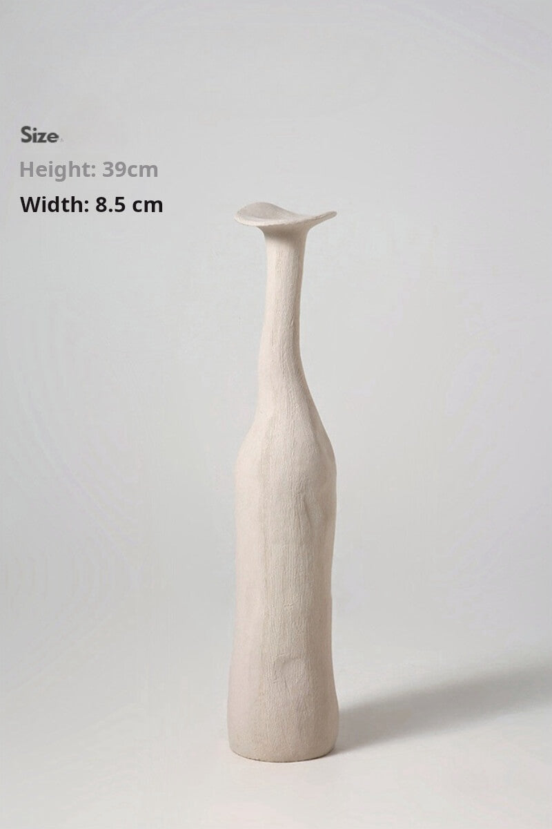 Artistic White Ceramic Vase - An artistic white ceramic vase, minimalistic yet elegant.