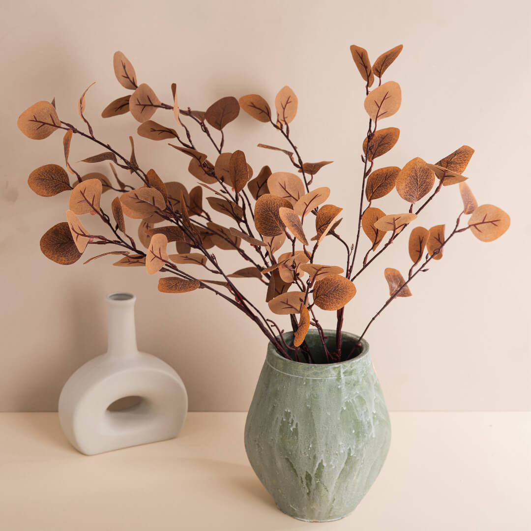 Eucalyptus branches in a vase in autumn.