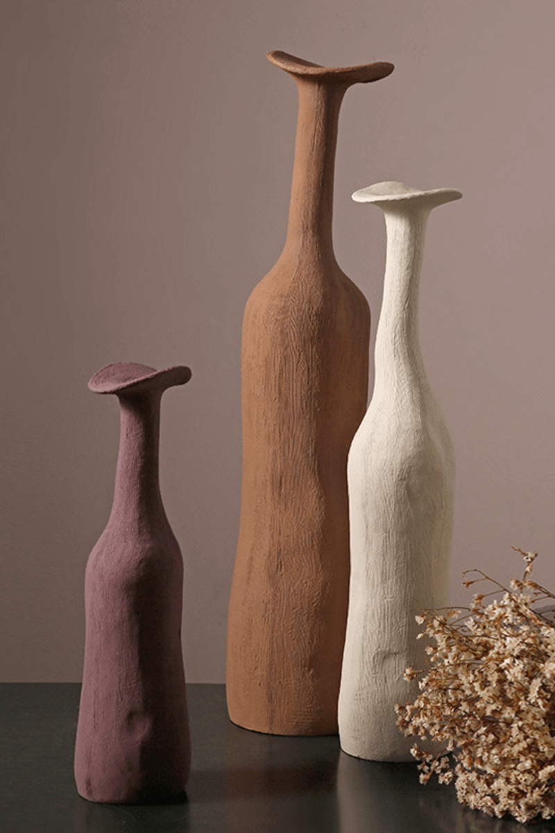 Vases as Focal Points in Living Room - These vases serve as eye-catching elements in your living area.