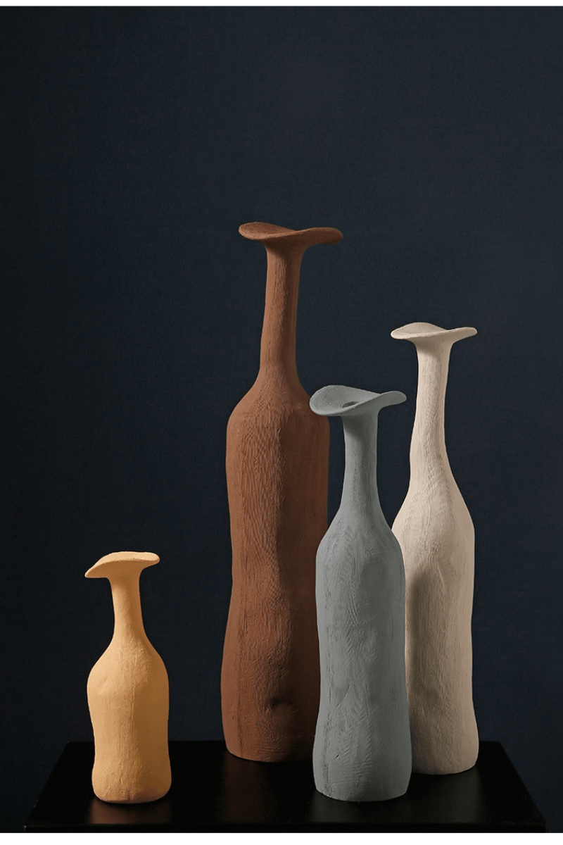 Vibrant Ceramic Vases for Space Enhancement - Add vibrancy to your space with these colorful vases.