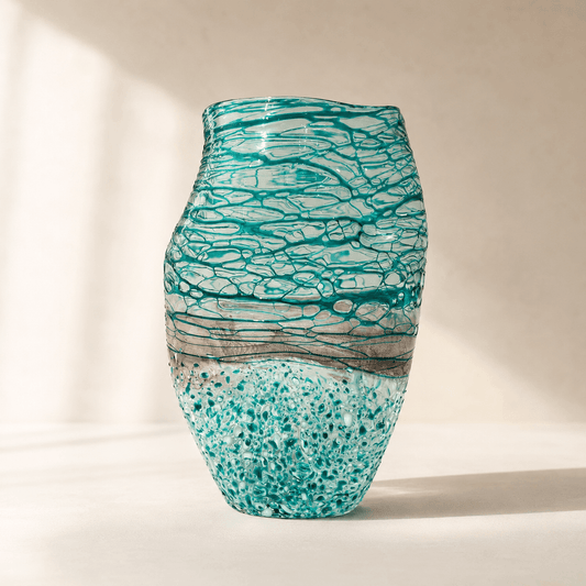 Large blue green textured art glass vase with irregular layered color