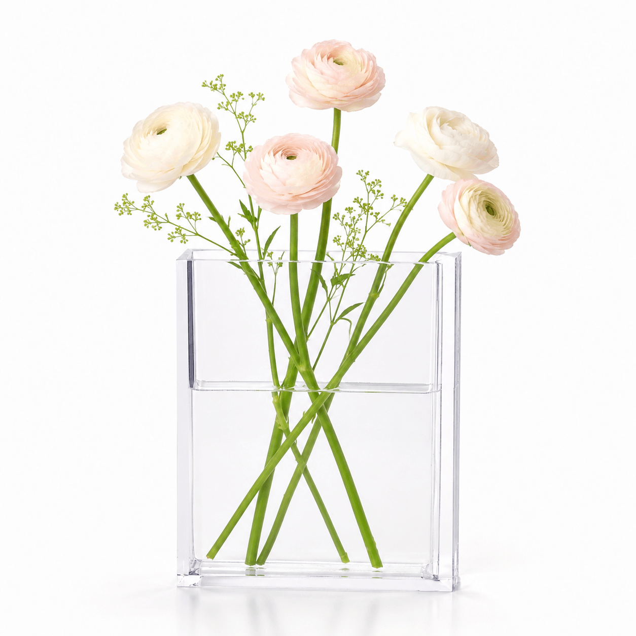 with-flowers
Clear acrylic book vase with soft pink and white flowers on a white background.