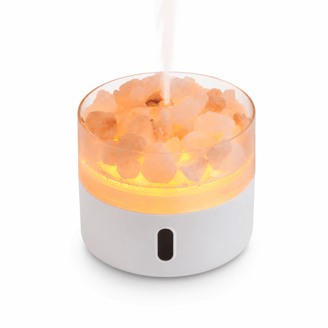Himalayan salt stone aroma diffuser with warm amber light and soft mist.