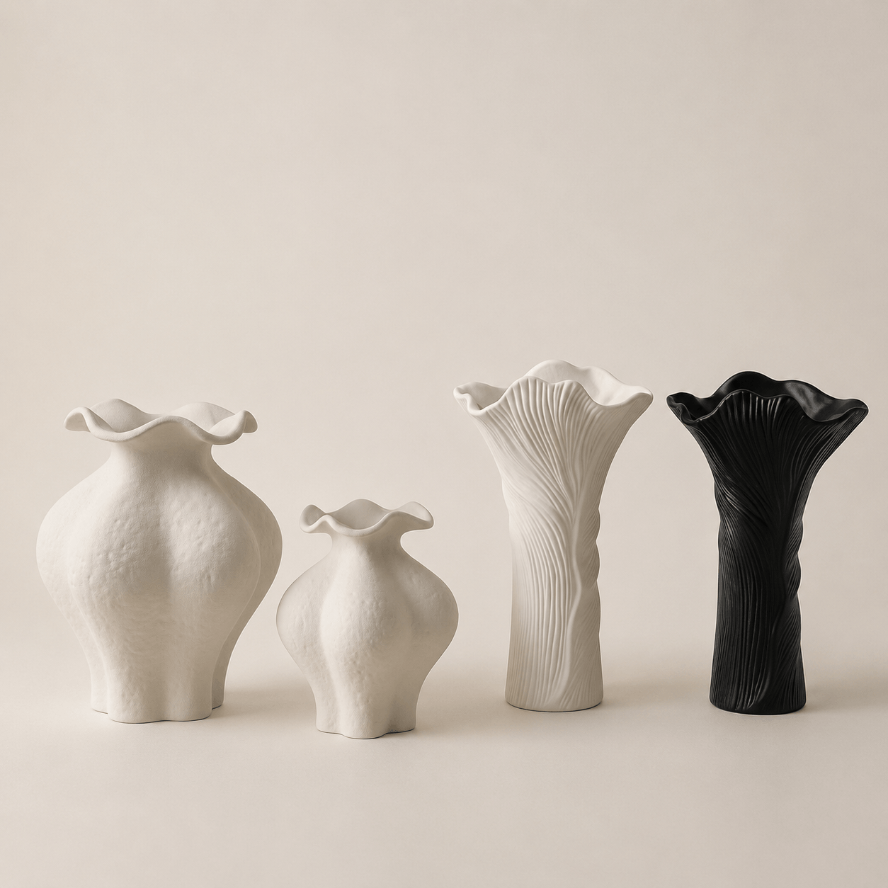 Organic sculptural ceramic vase collection in white and black styles