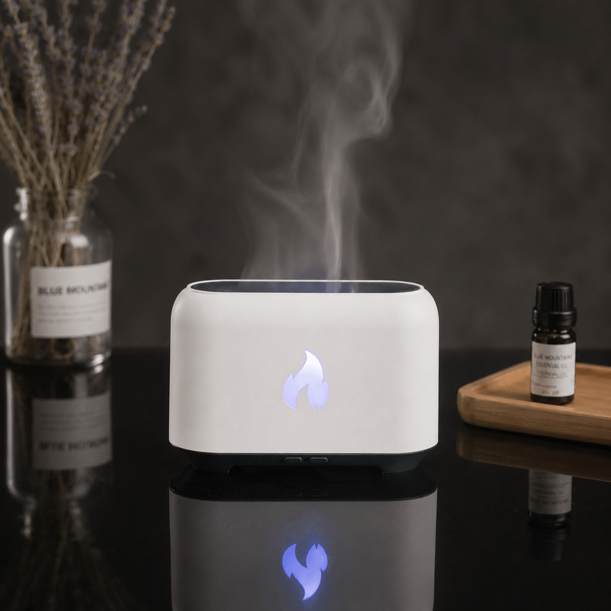 Close-up of the wood grain flame aroma diffuser with a soft glowing flame effect.