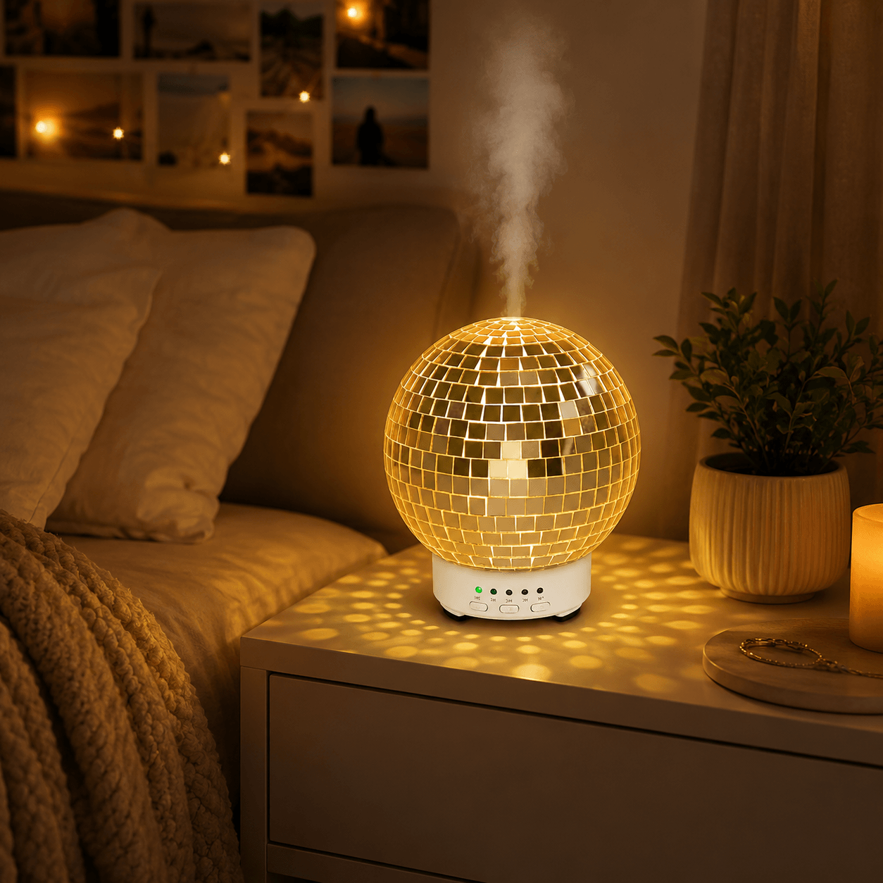Warm glowing disco ball humidifier on a bedside table with soft mist