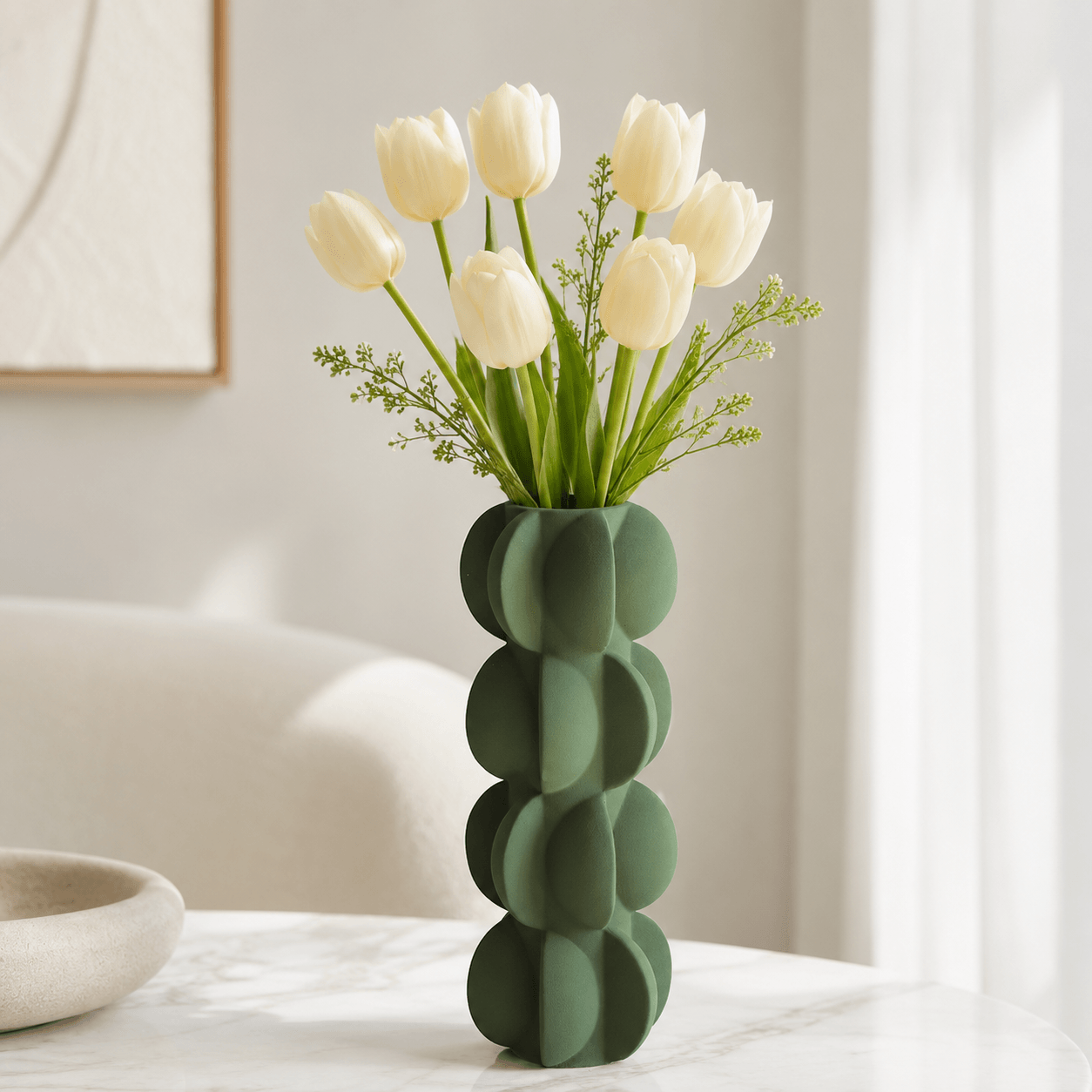 Olive Green Sculptural Bubble Ceramic Vase styled with white tulips in a bright modern interior