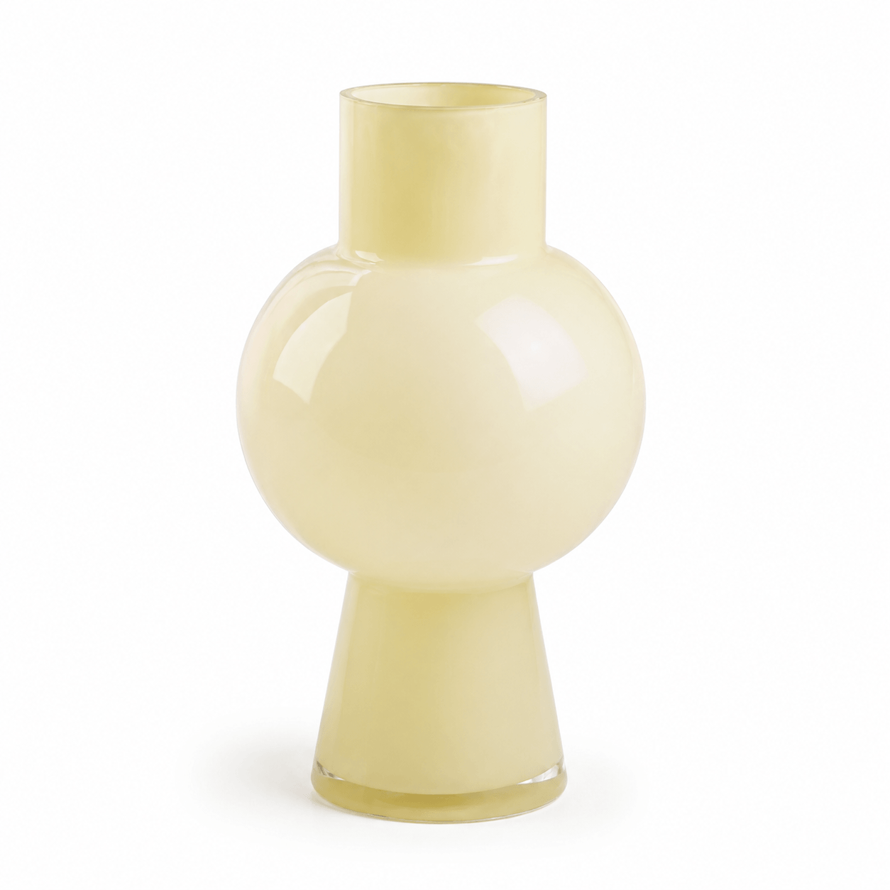 Tall ivory glass vase with a rounded center and tapered base on a white background