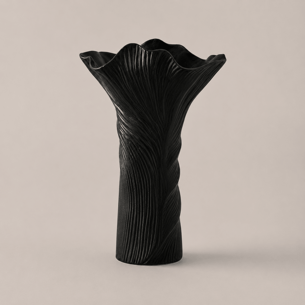 Flow Vase in Black with sculptural ribbed texture and flared wavy rim