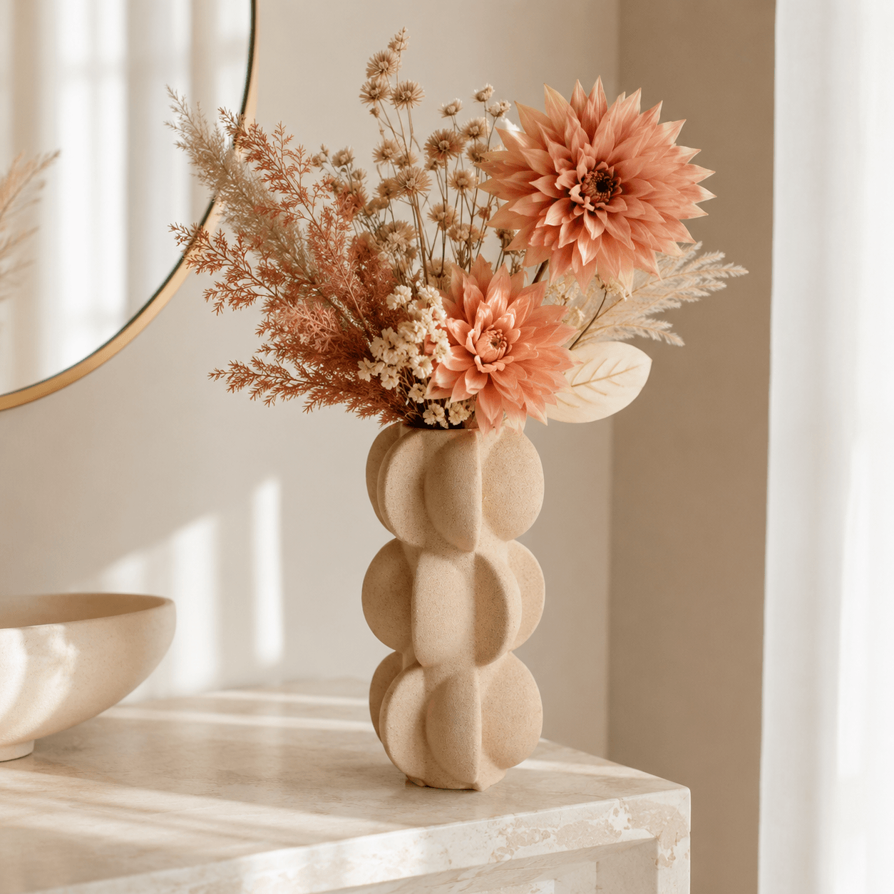 Sand Beige Sculptural Bubble Ceramic Vase styled with warm peach and cream flowers in a neutral home setting