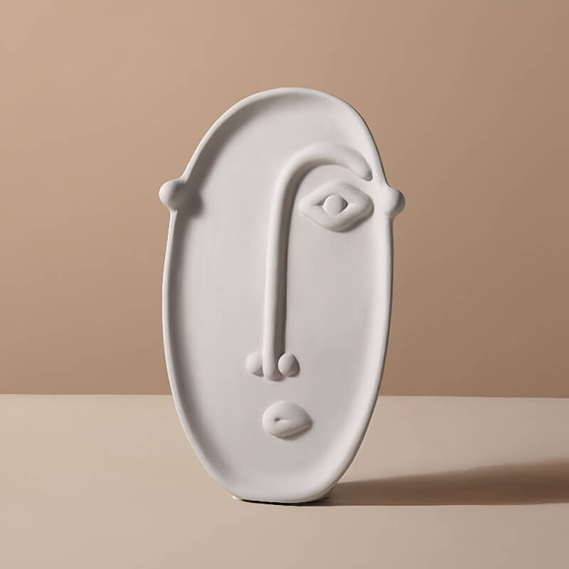 Artistic vase with long face design