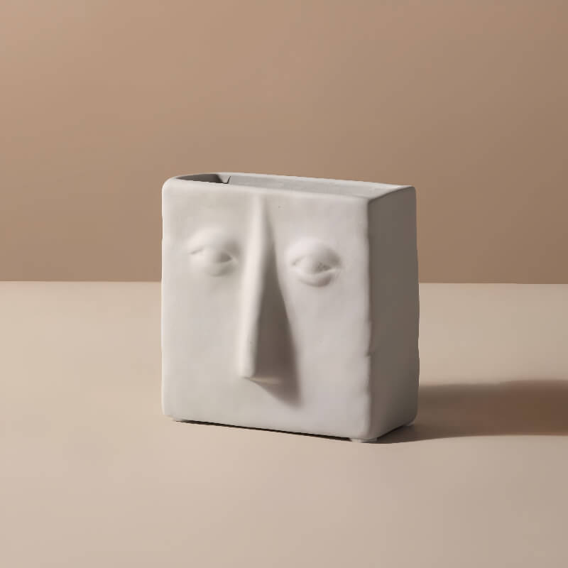 Artistic vase with small square face design