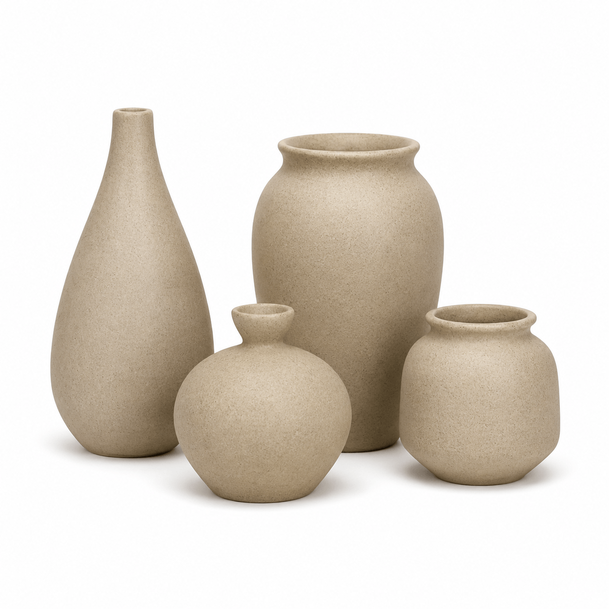 Four-piece ceramic vase set on a white background featuring mixed rounded and bottle-shaped designs.