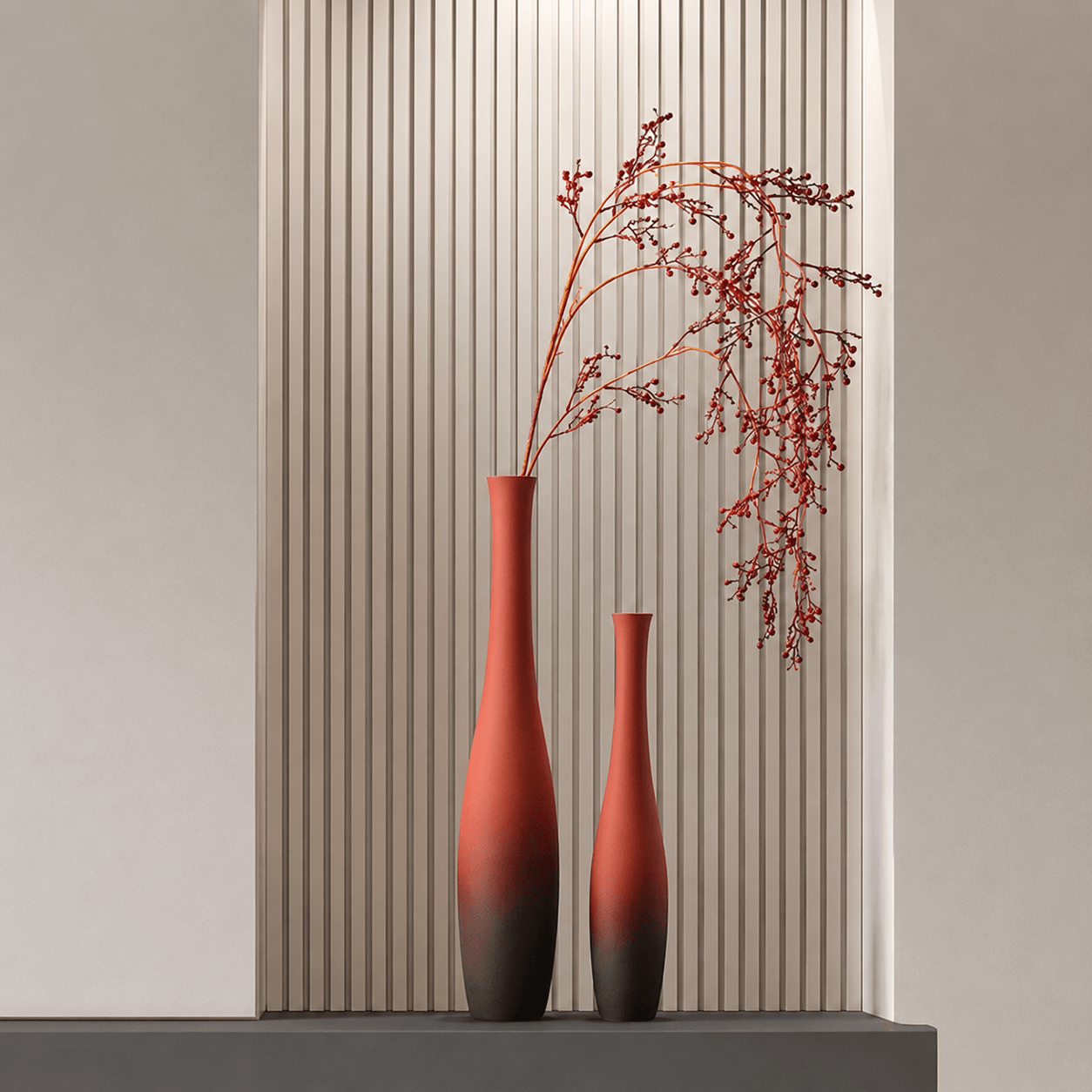 Large and small terracotta floor vase set styled with cascading red berry branches for refined interiors.
